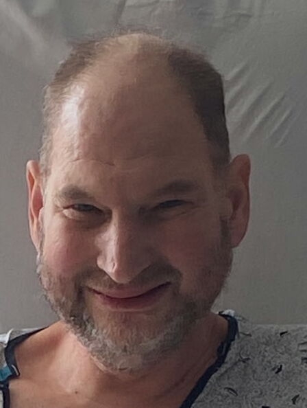Aaron D. Looman